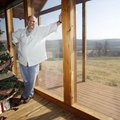 Chris Stecklein in his favorite personal space, the living room of his family's log cabin home in Ma...