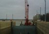 A temporary gate holds back water Wednesday at Montgomery Point Lock and Dam, allowing workers to repair hinges on lock gates. This photo was provided by the U.S. Army Corps of Engineers. 