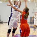 Lauren Schuldt, left, a Fayetteville sophomore forward, takes a shot in the lane over Springfield so...