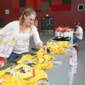 Sarah Senty selects a gift item Thursday during Operation Homefront’s workshop at the Armed Forces R...