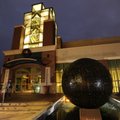 Visitors exit the Fayetteville Town Center on Friday on the Fayetteville square. 