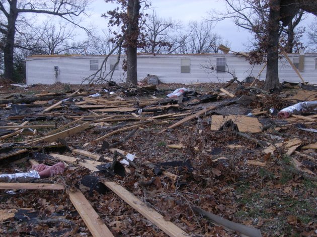 the-rooftop-remains-of-a-duplex-west-of-viola-are-shown-scattered-throughout-a-field-and-in-the-trees-after-strong-winds-and-a-possible-tornado-tore-through-the-area-sunday-afternoon