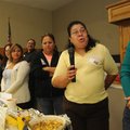 Carmen Contreras, second from right, tells the Padres gathering on Thursday at Grimes Elementary Sch...