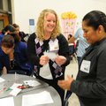 Heather Hart, center, a Grimes Elementary School teacher, welcomes Veronica dela Rosa, right, to the...
