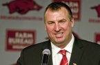 Arkansas coach Bret Bielema completed his first coaching staff with the hiring of wide receivers coach Michael Smith.