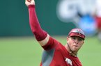Arkansas Democrat-Gazette/MICHAEL WOODS --06/13/2012-- University of Arkansas pitcher Colby Suggs throws during a practice at Baum Stadium. 