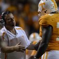Sam Pittman talks with Tennessee offensive lineman Zach Fulton during a game against Akron at Neylan...