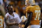 Sam Pittman talks with Tennessee offensive lineman Zach Fulton during a game against Akron at Neyland Stadium.