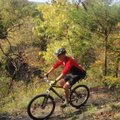 Tim Scott, assistant superintendent at Devil’s Den State Park pedals in October along the Fossil Fla...