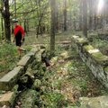Scott checks out a stone house foundation at what’s known as the Hale Place. A rerouted section of t...