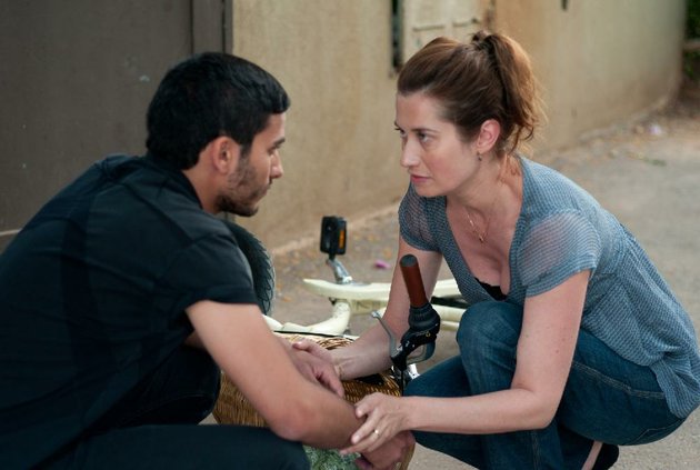 yacine-mehdi-dehbi-is-a-young-palestinian-man-who-finds-out-his-birth-mother-emmanuelle-devos-is-a-jewish-doctor-living-on-the-other-side-of-the-wall-separating-the-occupied-west-bank-from-israel-in-lorraine-levys-the-other-son