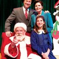 Fred Mackaman, front left, performs as Kris Kringle in “Miracle on 34th Street” Saturday at Alma Per...
