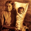 Comanche mother and her baby were photographed by Curtis. Although he was shooting at the turn of th...