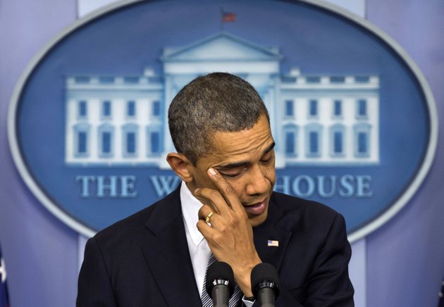president-barack-obama-wipes-his-eye-as-he-talks-about-the-connecticut-elementary-school-shooting-friday-dec-14-2012-in-the-white-house-briefing-room-in-washington
