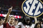 Alabama head coach Nick Saban and running back Eddie Lacy after their 32-28 win in the Southeastern Conference championship NCAA college football game against Georgia, Saturday, Dec. 1, 2012, in Atlanta. (AP Photo/David Goldman)
