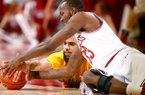 NWA Media/JASON IVESTER -- Arkansas junior Marshawn Powell and Alcorn State senior Ian Francis go after a loose ball on the floor during the first half on Saturday, Dec. 15, 2012, at Bud Walton Arena in Fayetteville.