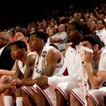 Arkansas' bench looks on during a win over Oklahoma on Dec. 4. 