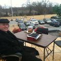 Bentonville Superintendent Michael Poore working from the roof Wednesday morning.