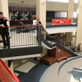 Cpl. Tommy Wooten of the Springdale Police Department listens to his radio Tuesday at Springdale Har...