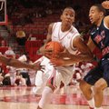 Arkansas sophomore guard BJ Young drives to the lane as Robert Morris junior guard Caron Williams ap...