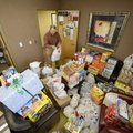Brent Leas, a Bentonville School Board member, drops off a nonperishable food donation Wednesday in ...