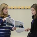 Emily Hirsch (left), Arkansas campus director for Responsive Education Solutions, answers questions ...
