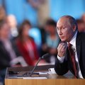 Russian President Vladimir Putin speaks during a news conference in Moscow, Russia, Thursday, Dec. 2...