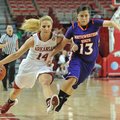 NWA Media/MICHAEL WOODS --12/21/2012-- Arkansas' Erin Gatling tries to get the ball past Northwester...