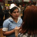 Gabriella Arroyo, a sixth-grader, recounts Thursday the story of Monica Benning, a nurse on duty dur...