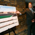 Hooper details a new Supercenter on Thursday to be built in Springdale. 