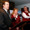 Brian Hooper, from left, Walmart vice president of real estate, property owner Robin Lundstrum and M...
