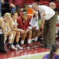 Arkansas women’s Coach Tom Collen talks with his team during the first half of Friday’s game against...