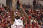 Arkansas' Marshawn Powell drives to the basket in the second half against Alabama A&M's Saturday night at Verizon Arena in North Little Rock. He finished with 20 points.