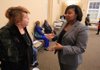 Carrie Raglon (right) of the city of Little Rock and Christine Beems, chairman of the Public Relations Committee of the Central Arkansas Reentry Coalition, talk about a new initiative to help former inmates or homeless people settle into new lives in Little Rock.


