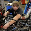 Corbin Hulsizer adjusts the lifters on a diesel engine Dec. 12 at Northwest Technical Institute in S...