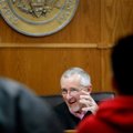 Ernest Cate, Springdale District Court judge, speaks Thursday to people appearing in the court. 