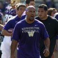 Former Washington running backs coach Joel Thomas will make $235,000 in the same role at Arkansas. 