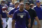 Former Washington running backs coach Joel Thomas will make $235,000 in the same role at Arkansas.