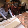 Carolyn Reno (left), collections manager with Shiloh Museum of Ozark History, and Marty Benson, a me...