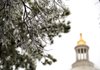  Icicles weigh down the branches of trees on the grounds of the Arkansas State Capitol on Christmas Day. Freezing rain fell over most of Arkansas before a strong winter storm and snow was forecasted to hit Arkansas late Tuesday night.