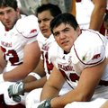 Arkansas center Jonathan Luigs looks toward the scoreboard during the fourth quarter against Texas S...