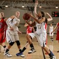 Bentonville’s Rashaun Casey drives to the basket during the Lady Tigers’ game Wednesday against East...