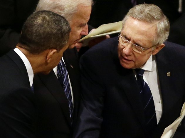 president-barack-obama-talks-with-senate-majority-leader-harry-reid-of-nevada-at-the-funeral-service-for-the-late-sen-daniel-inouye-d-hawaii-at-the-washington-national-cathedral-friday-dec-21-2012-at-center-is-vice-president-joe-biden