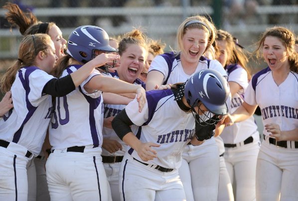 Fayetteville's Brittany Hoskins, center, is ...