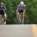 Kennett Peterson of Hagens Berman Cycling, left, attempts to hold off Brian McCulloch of CashCall Mo...