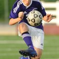 Fayetteville sophomore Foster Johnson redirects the ball Friday, April 27, 2012, during the first ha...