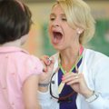 Dr. Rebecca Lucke, a dentist based in Fayetteville, demonstrates Friday, Aug. 17, 2012, how she woul...