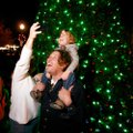 Cinthia Vlaovich takes a photo of her husband Dean Vlaovich and their son Nicholas Vlaovich, 3, all ...