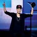 Uber-popular music act Justin Bieber, pictured here accepting a 2012 American Music Award for best p...