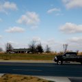 A truck passes west along Elm Springs Road near the intersection with North 48th Street on Dec. 20 i...